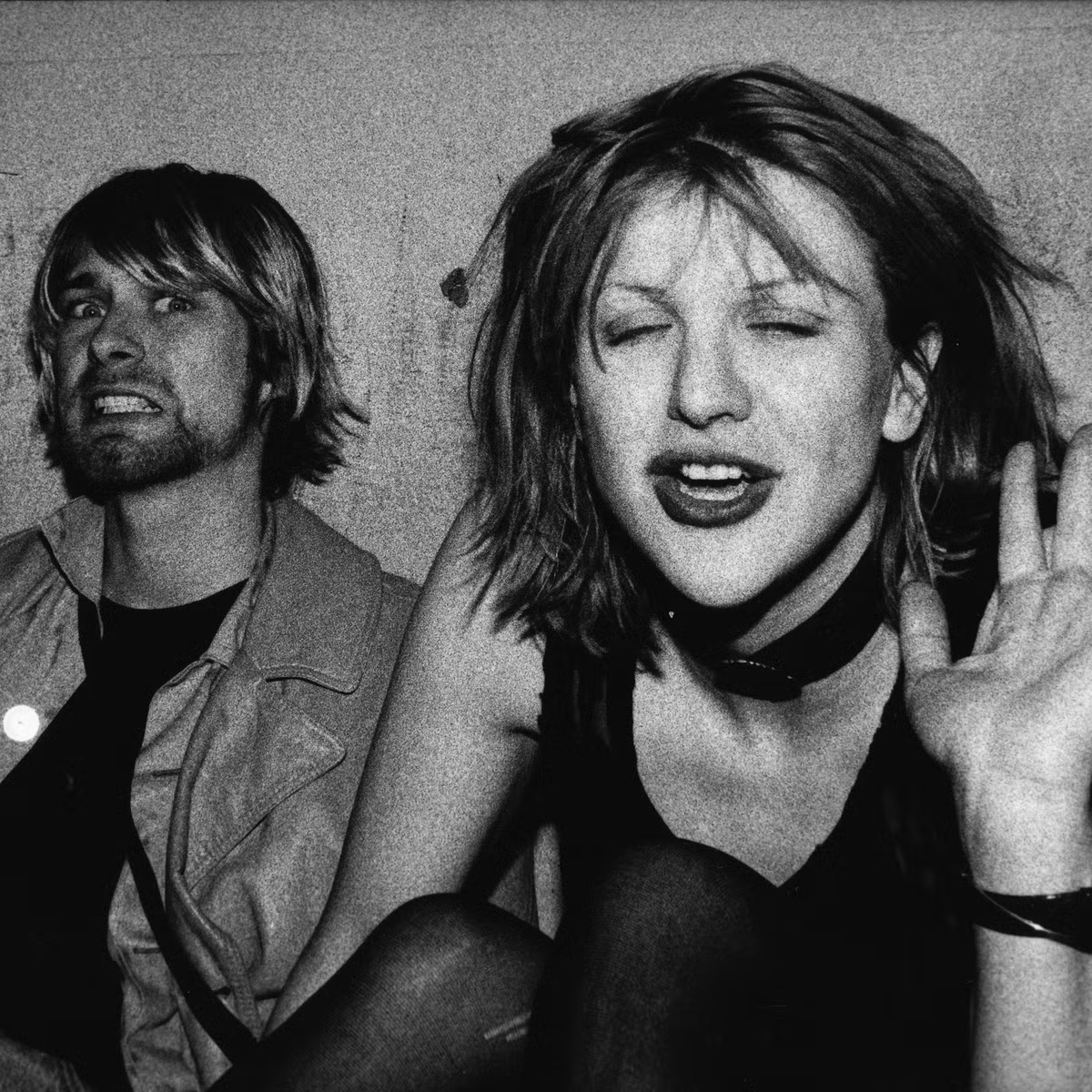 Kurt cobain and courtney love pose for photograph kurt grimacing for the camera and courtney w