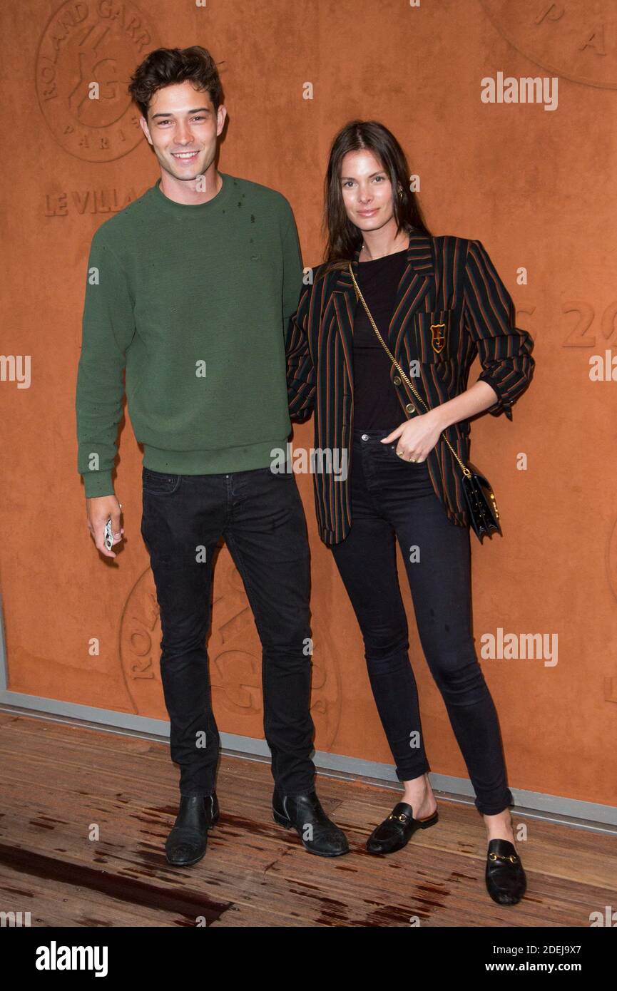 Francisco lachowski and his wife jessiann gravel beland in village during french tennis open a