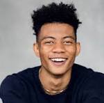 Studio Portrait of Young Handsome Mixed Race Man by Stocksy Contributor  Nicklaus Walter