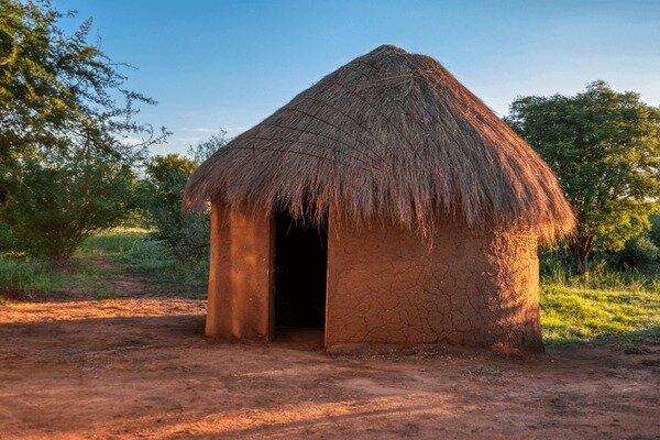 African mud house thatched roof 600nw 2676560725