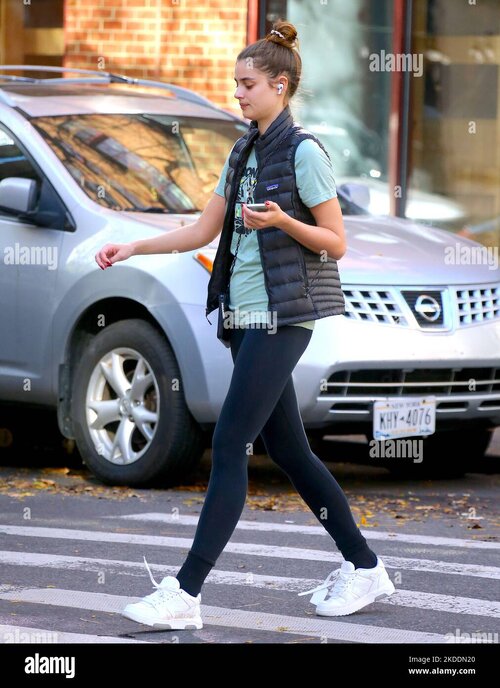 model-taylor-hill-walking-early-in-the-morining-on-sixth-avenue-in-soho-new-york-ny-on-novembe...jpg