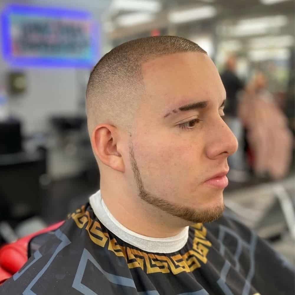 Man with a buzz cut and chin strap beard 1