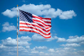 USA flag on blue sky · Free Stock Photo