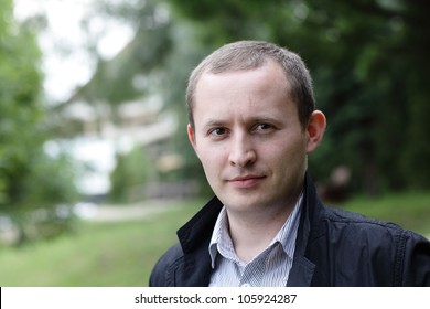 Portrait mid adult man park 260nw 105924287