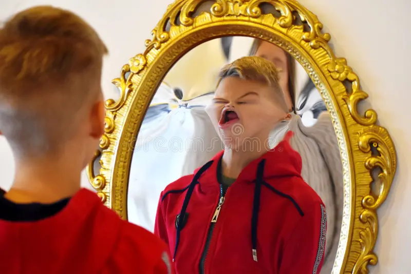 Child reflected distorting mirror fun reflection boy children s entertainment looking funny r