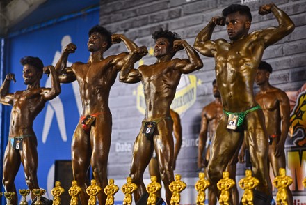Indian bodybuilders pose during bodybuilding fitness competition 440nw 13960285h