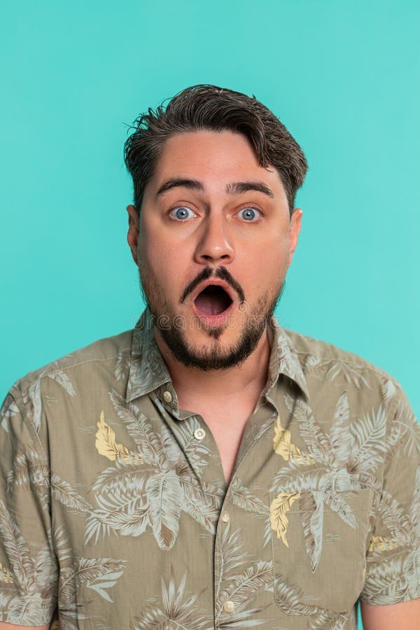 Adult man raising eyebrows opening mouth widening eyes sudden surprise shock extreme emotion m