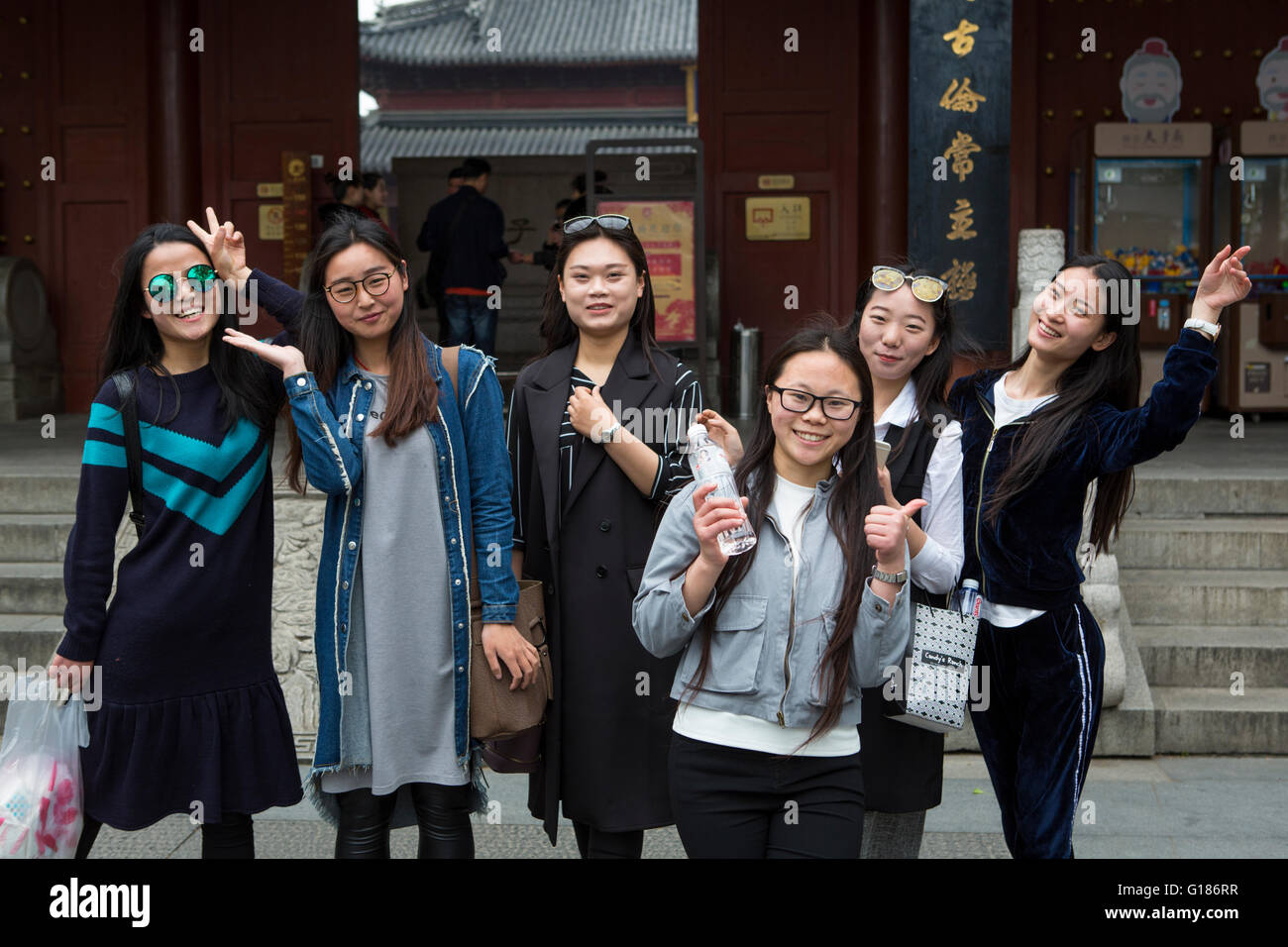 Group of young chinese girls posing and having fun in a street nanjing G186RR