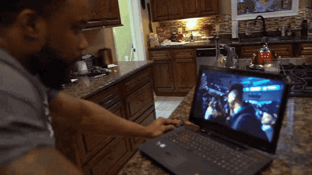 Punching laptop