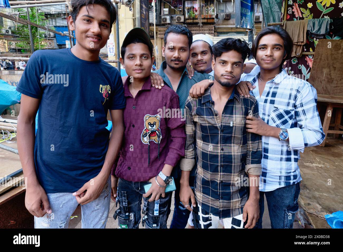 A group pf young muslim men posing in muslim dominated area dongri mohamed ali road in mumbai 