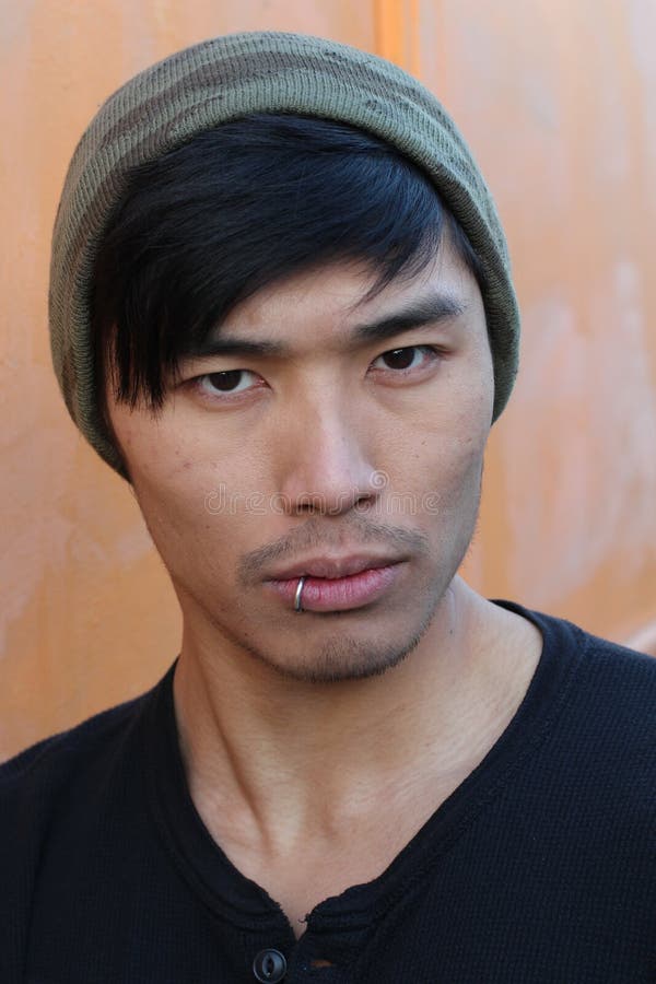 Asian man piercing beanie 95498358