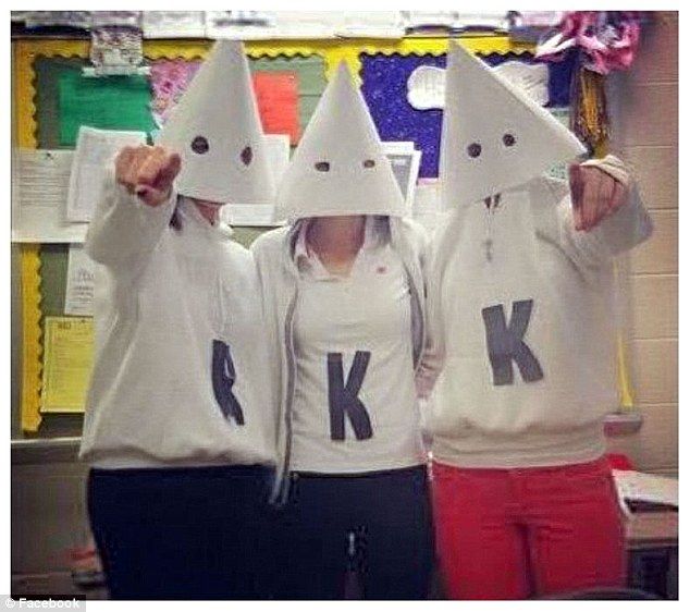 High school students dressing up as members of the Klu Klux Klan