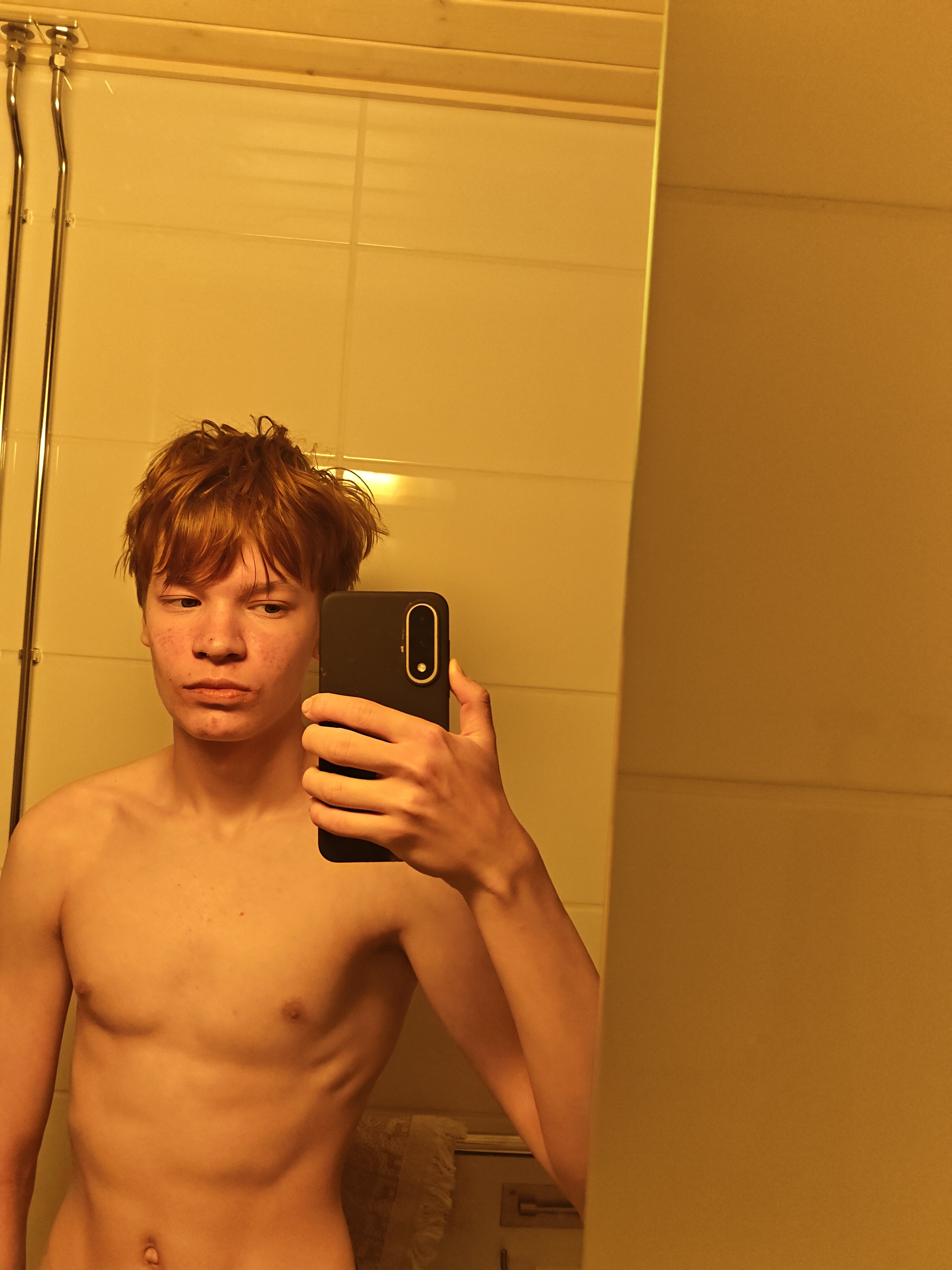 12577