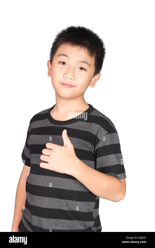 Asian boy kid making showing thumbs up with a smiling isolated on KJJR33