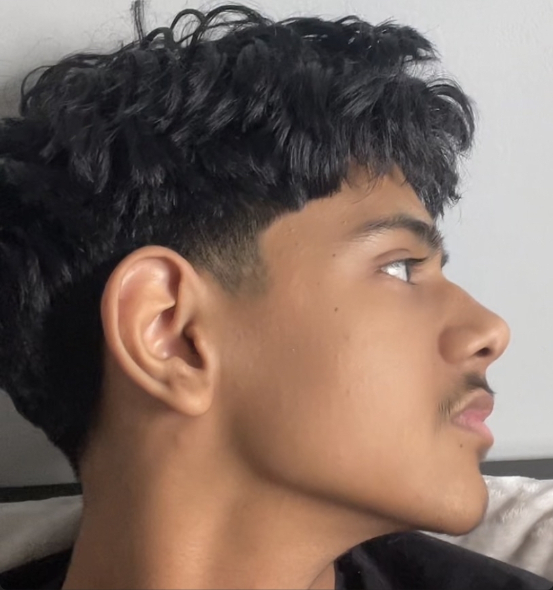 1000098010