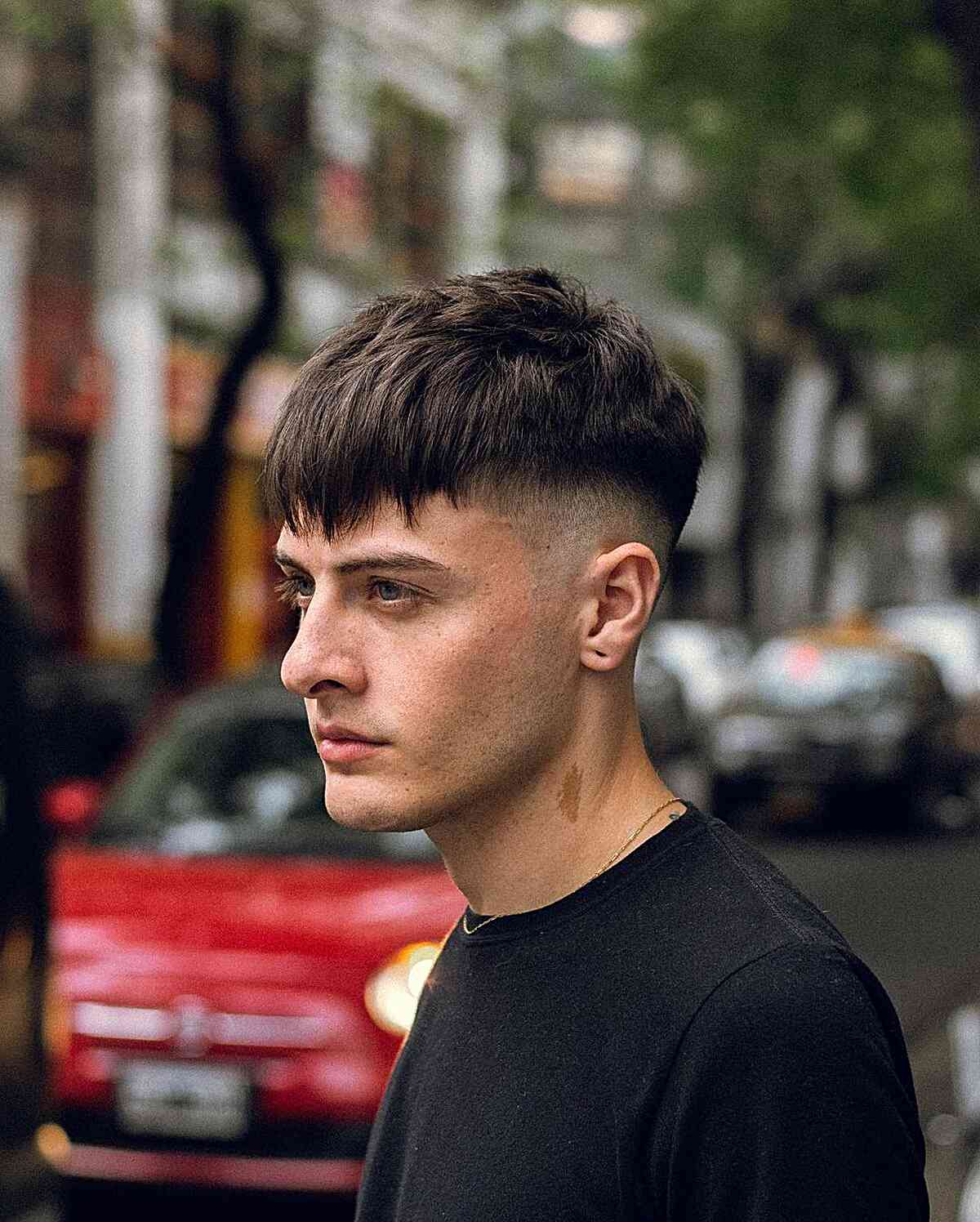 Short messy french crop with choppy layers and bangs for young men