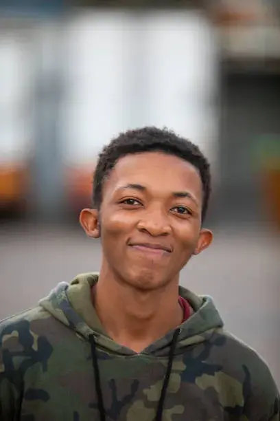 African young man with an army style jacket