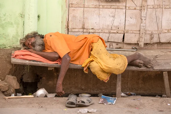 Depositphotos 71048765 stock photo indian homeless man sleeps near