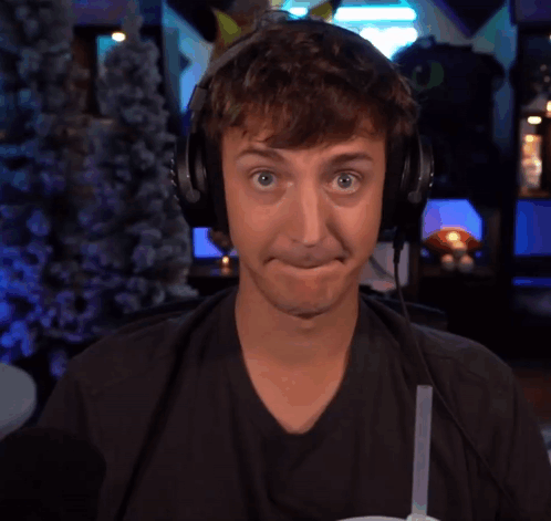 Ninja low taper fade face holding back laughter