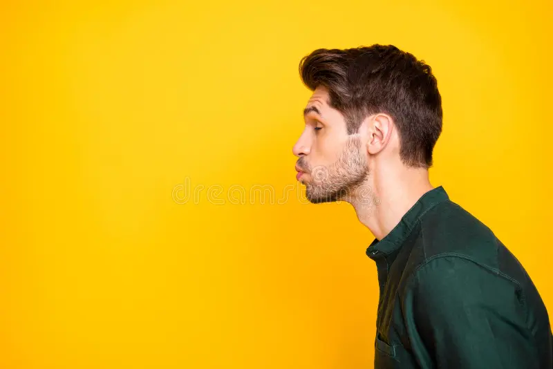 Side profile photo tender man full feelings pouting his lips to kiss empty space next to him 