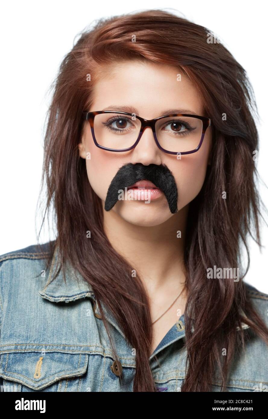 Brunette woman wearing fake moustache 2C8C421