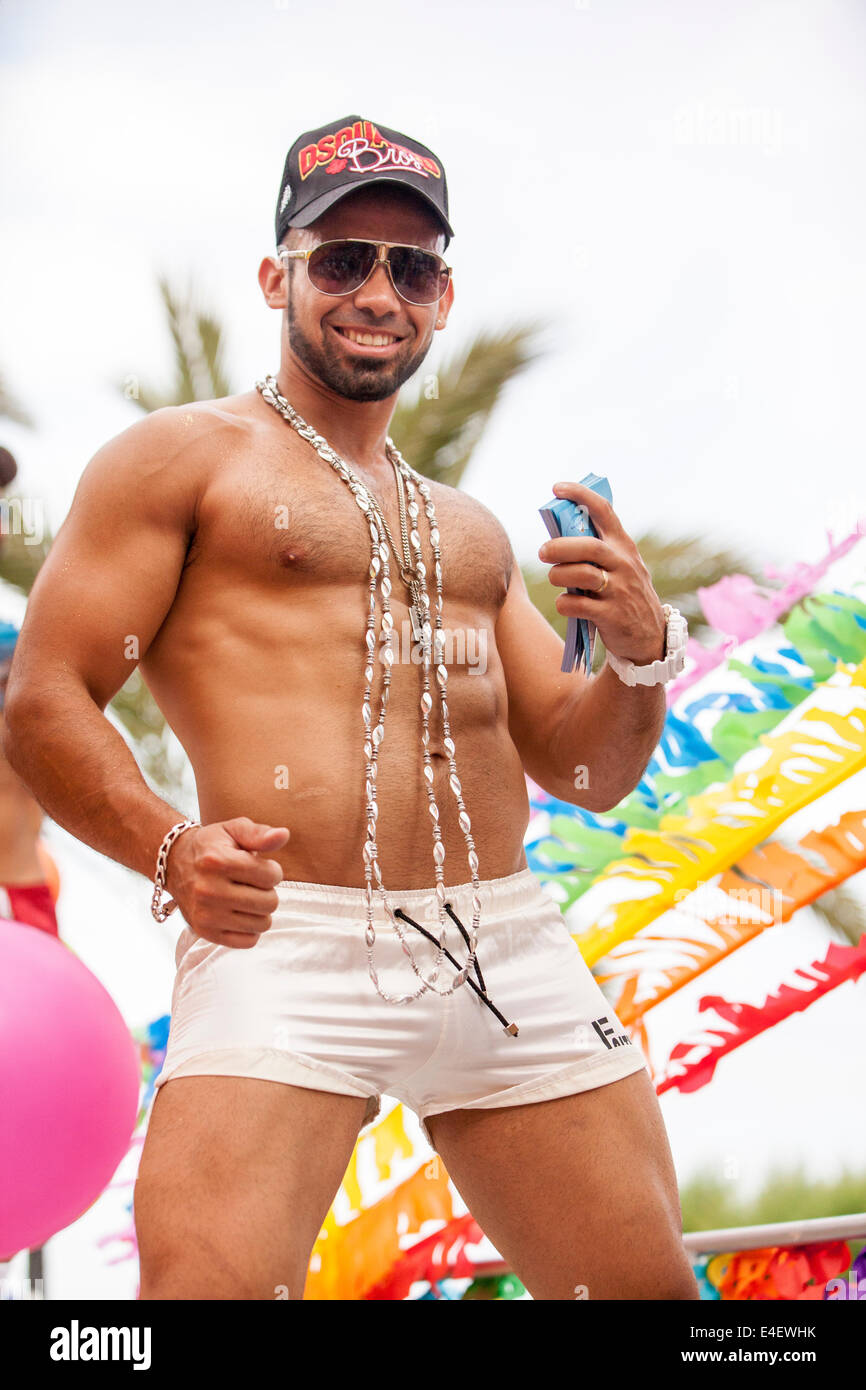 Muscular latino guy at gay pride in sitges E4EWHK