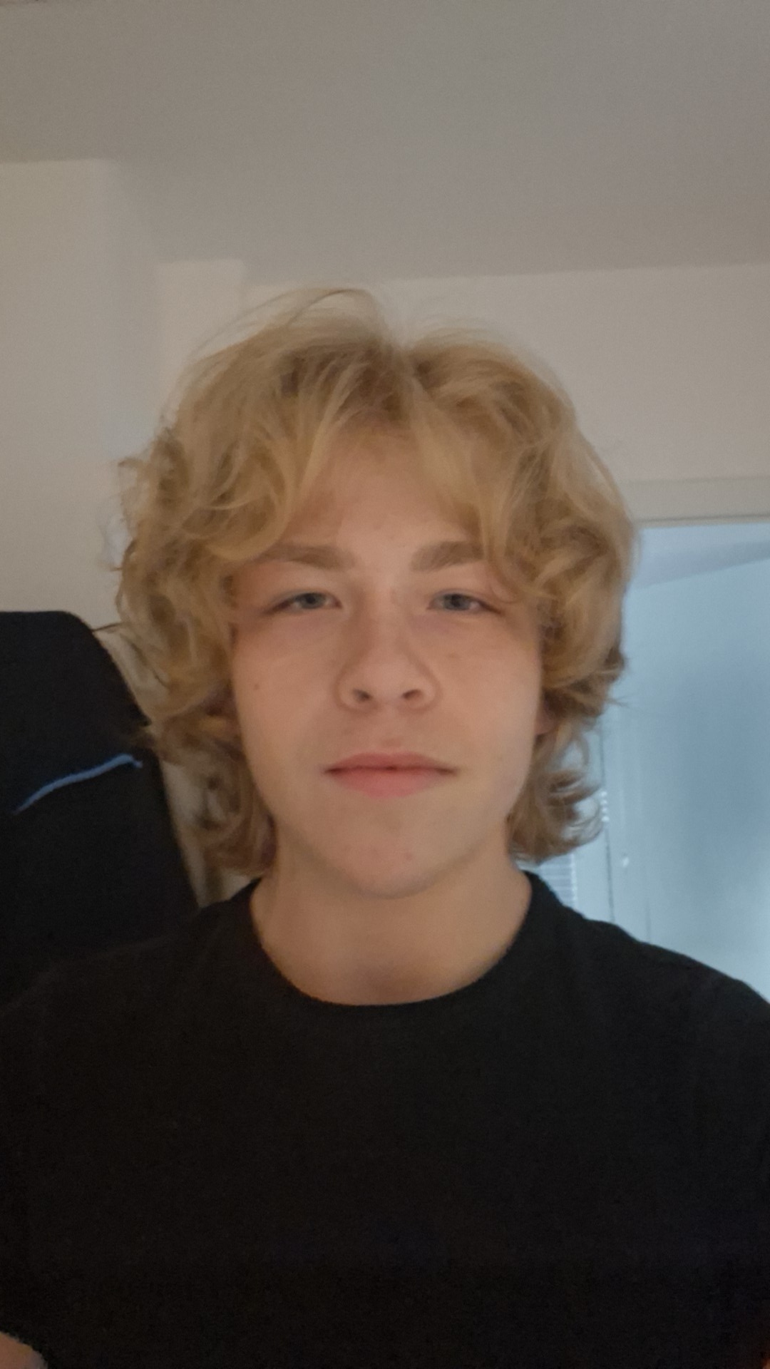 76990
