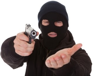 Burglar wearing mask aiming gun 260nw 149245298 edit 205106833773944