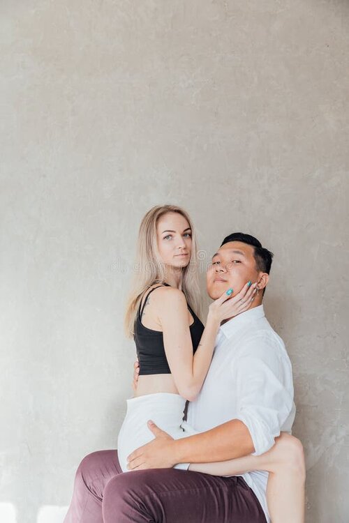 asian-men-women-sitting-hugging-together-man-blonde-woman-376290015.jpg