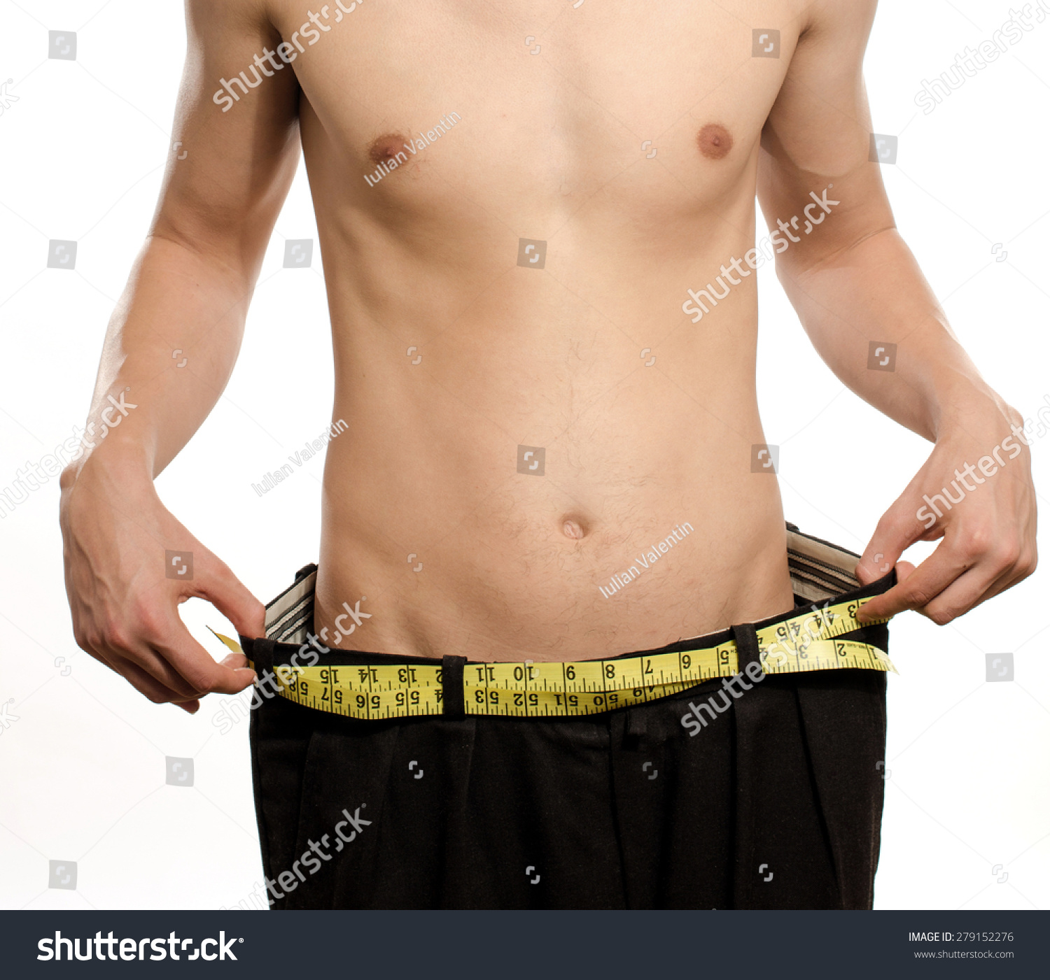 Stock photo skinny young man with large pants anorexic look slim body man lost weight and comp