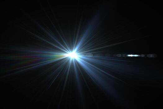 Bright beam of a searchlight on a dark background light from a lamp in the dark flash photo
